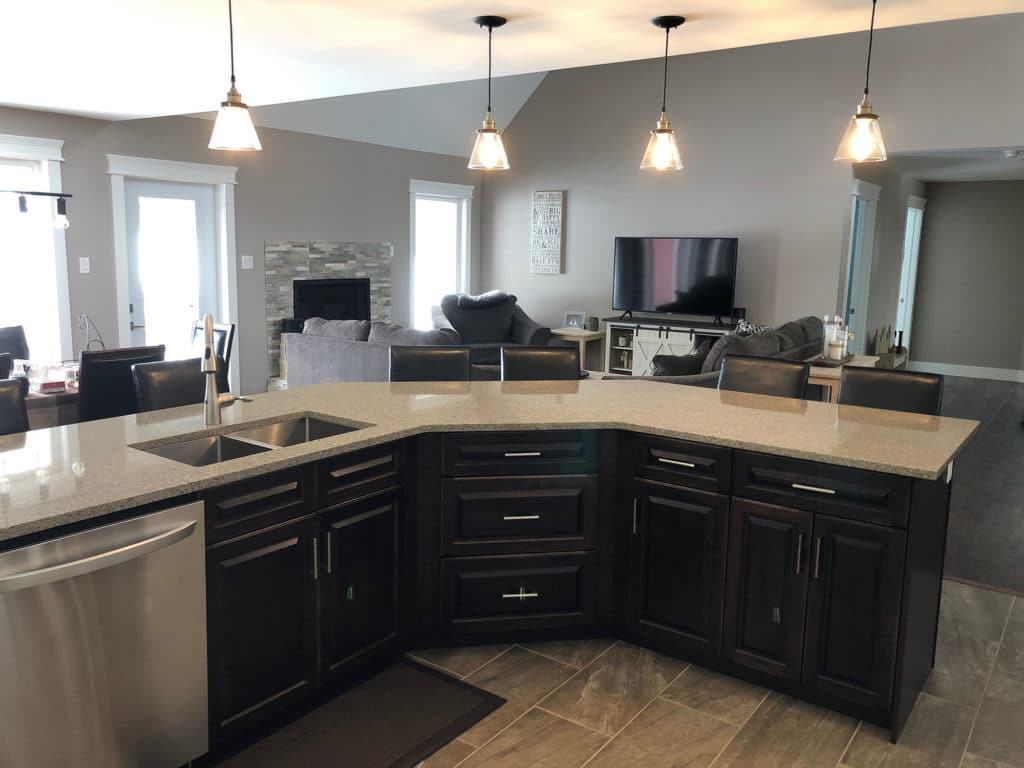 Dark stained birch wood raised panel angled kitchen island