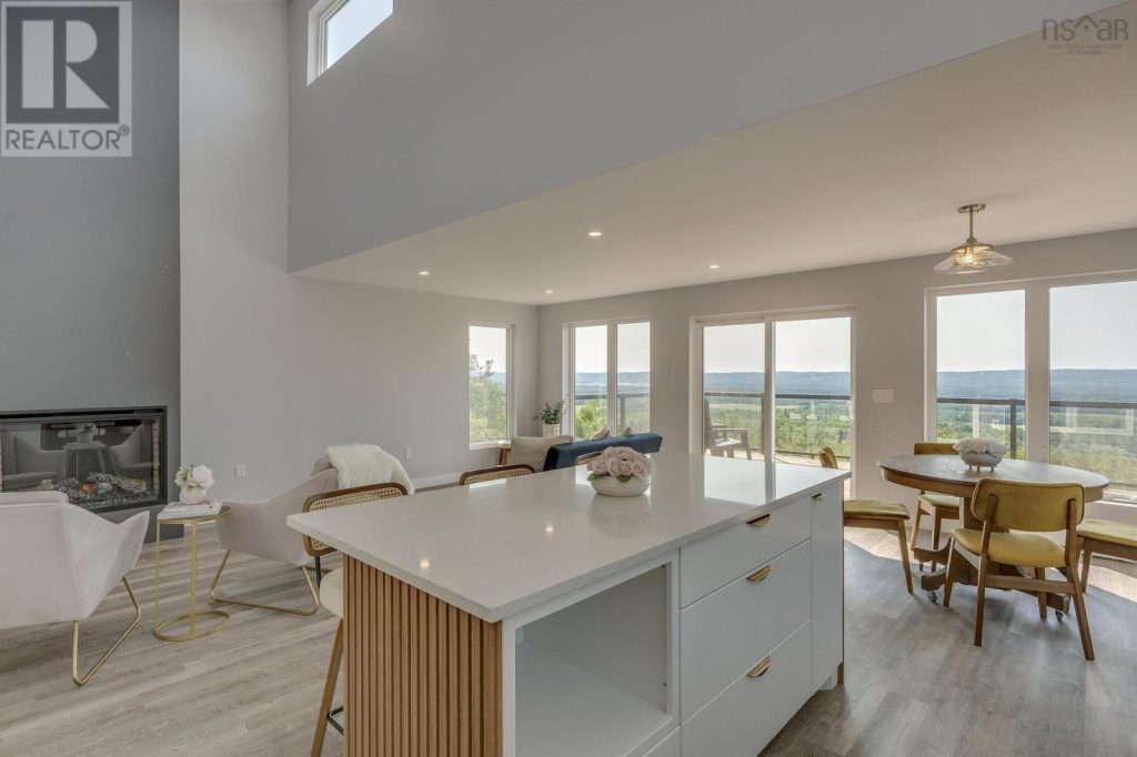 Mid-century modern kitchen in white shaker with champagne bronze hardware